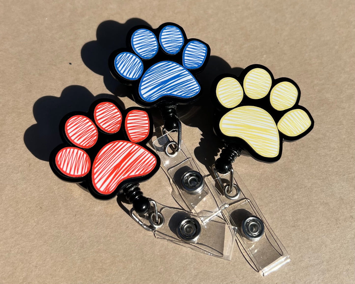 Puppy Paw Print Acrylic Badge Reel - Vibrant Paw Print Design, Durable Acrylic Reel, Easy to Attach, Ideal for Office & School Accessories