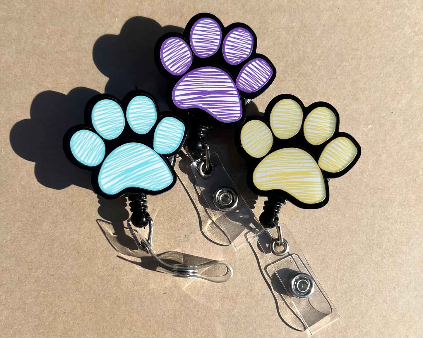 Puppy Paw Print Acrylic Badge Reel - Vibrant Paw Print Design, Durable Acrylic Reel, Easy to Attach, Ideal for Office & School Accessories